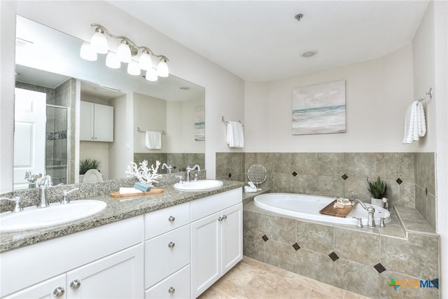 3404 American Dr Unit 3315, Lago Vista, TX 78645 - full bath featuring a sink, a bath, double vanity, and a stall shower