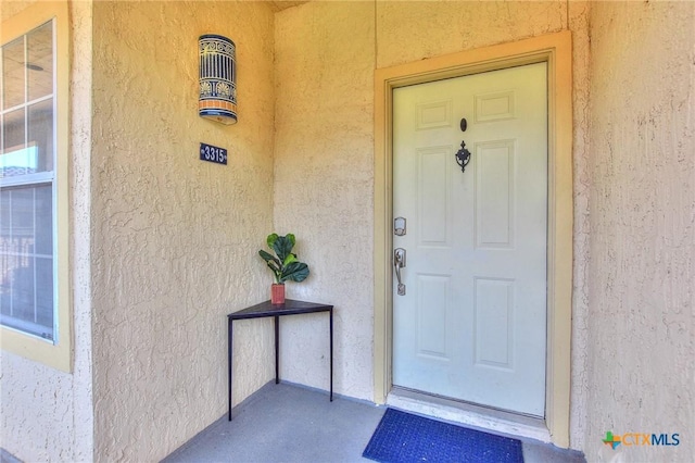 3404 American Dr Unit 3315, Lago Vista, TX 78645 - doorway to property featuring stucco siding