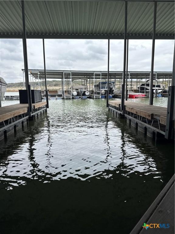 3404 American Dr Unit 3315, Lago Vista, TX 78645 - view of dock featuring a water view and boat lift