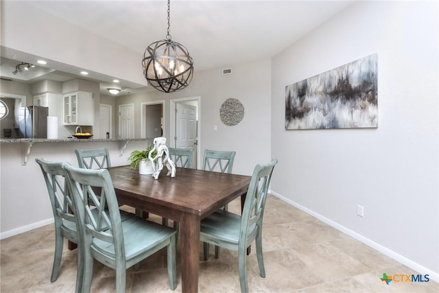 3404 American Dr Unit 3315, Lago Vista, TX 78645 - dining space featuring visible vents, a notable chandelier, baseboards, and recessed lighting
