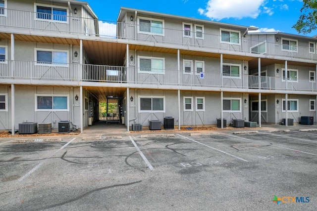 view of property featuring central AC unit