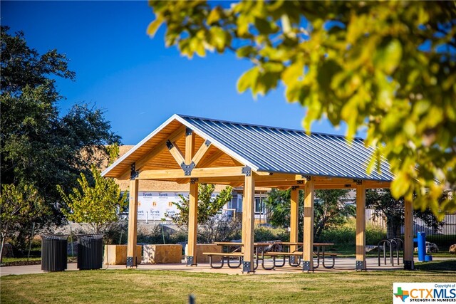 surrounding community featuring a lawn and a gazebo