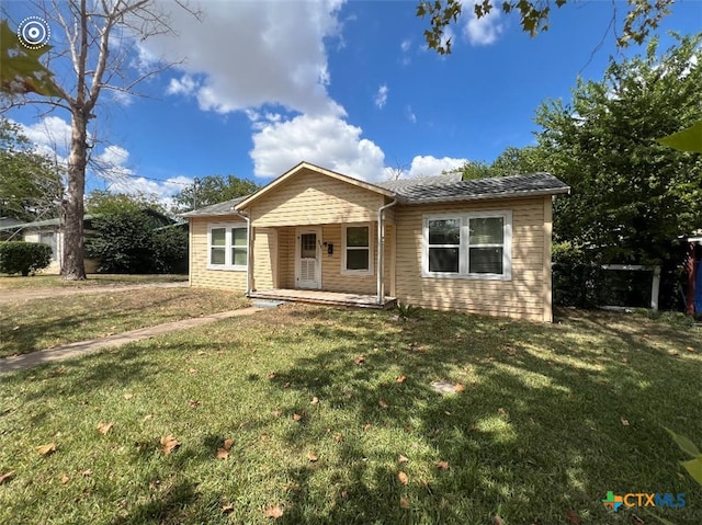 ranch-style house with a front yard