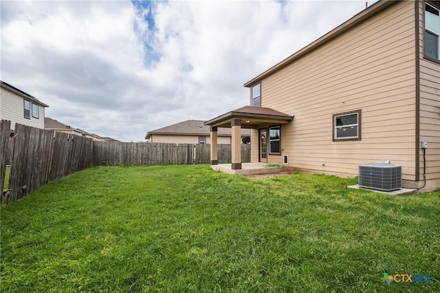 8913 Winter Haven Rd, Austin, TX 78747 - rear view of house featuring central air condition unit and a patio