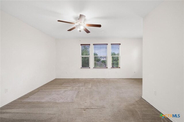 8913 Winter Haven Rd, Austin, TX 78747 - spare room with ceiling fan, carpet, and baseboards