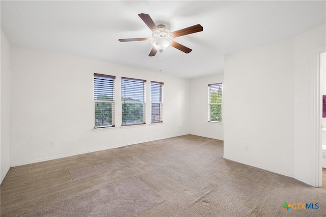 8913 Winter Haven Rd, Austin, TX 78747 - carpeted spare room with ceiling fan and baseboards