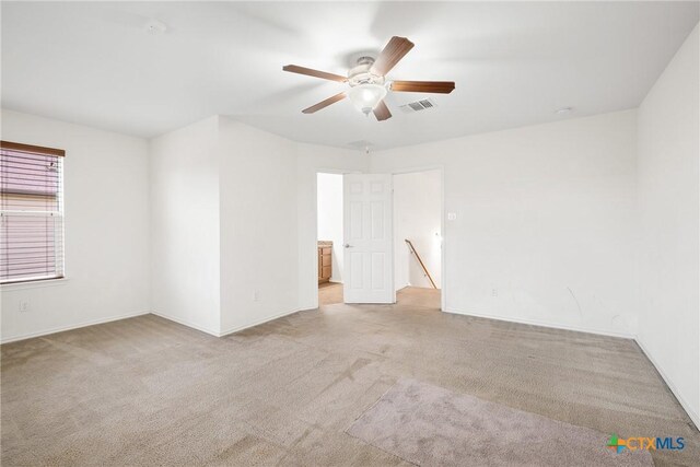 8913 Winter Haven Rd, Austin, TX 78747 - unfurnished room with carpet, a ceiling fan, and baseboards