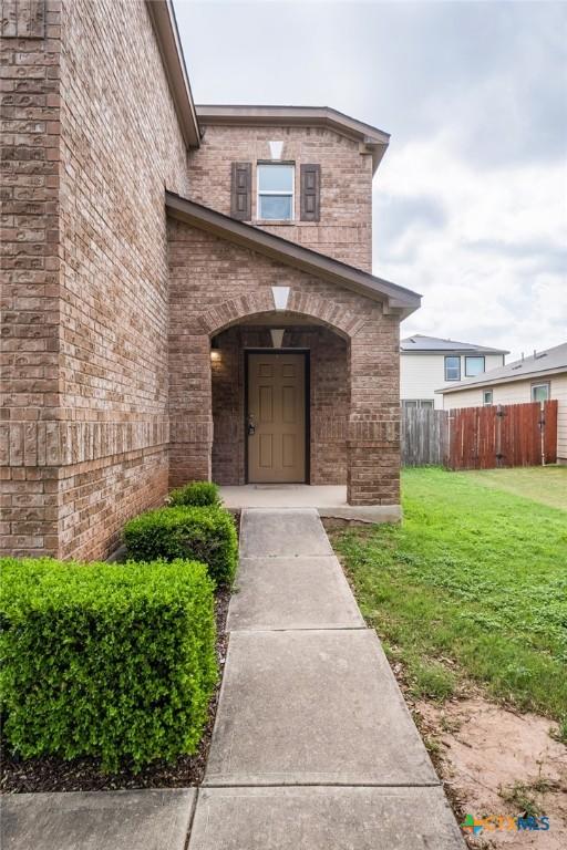 8913 Winter Haven Rd, Austin, TX 78747 - entrance to property with brick siding