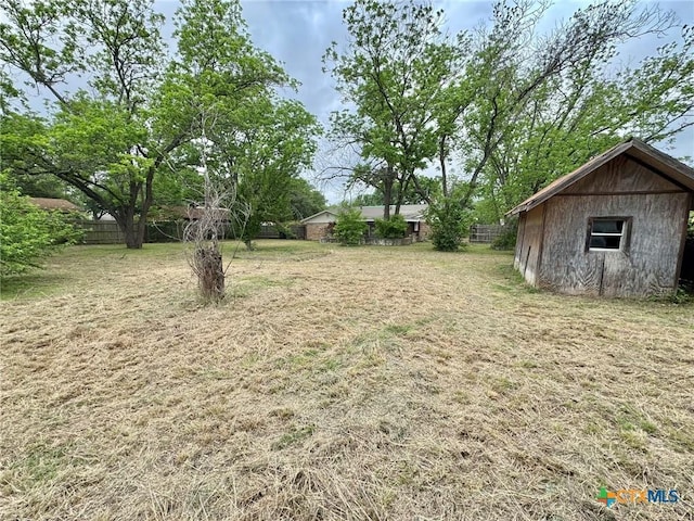 1804 Prather Dr, Killeen, TX 76541 - view of yard featuring fence and an outdoor structure