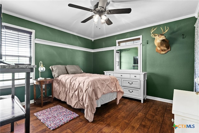 bedroom featuring dark hardwood / wood-style flooring, ornamental molding, and ceiling fan