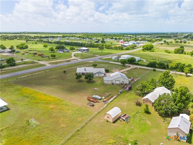 birds eye view of property featuring a rural view