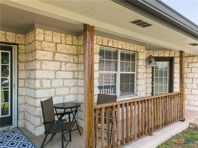 exterior space featuring covered porch