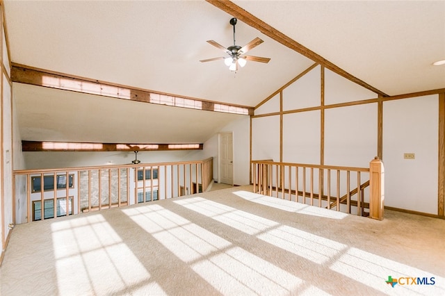 bonus room featuring high vaulted ceiling, carpet, and ceiling fan