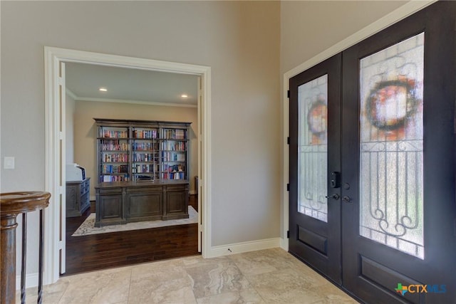 2326 Haven Bluff Ct, New Braunfels, TX 78132 - foyer featuring french doors, crown molding, and baseboards