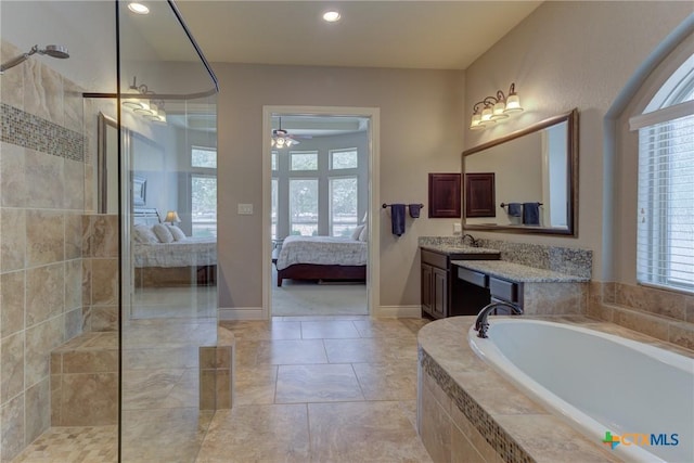 2326 Haven Bluff Ct, New Braunfels, TX 78132 - full bath featuring ensuite bath, ceiling fan, a garden tub, vanity, and walk in shower