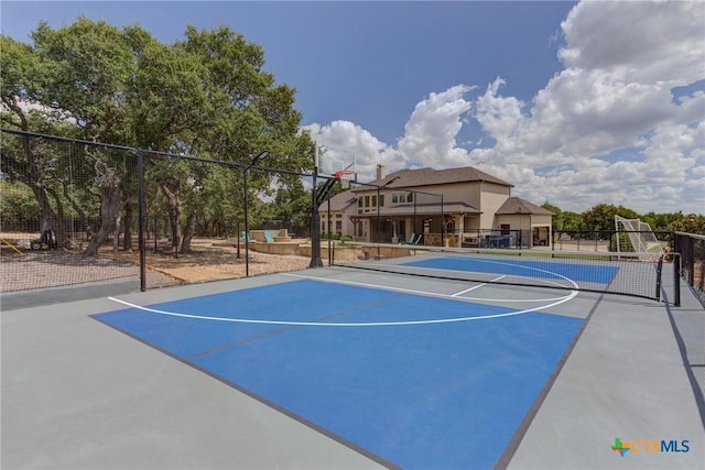 2326 Haven Bluff Ct, New Braunfels, TX 78132 - view of basketball court featuring community basketball court, fence, and a tennis court