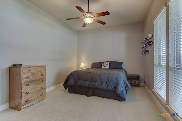 2326 Haven Bluff Ct, New Braunfels, TX 78132 - carpeted bedroom featuring multiple windows, baseboards, lofted ceiling, and ceiling fan