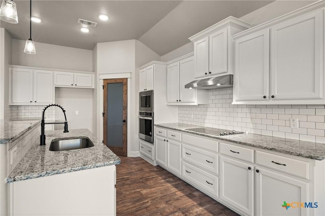 6119 Big Tree Dr, Salado, TX 76571 - kitchen with a sink, under cabinet range hood, black electric cooktop, white cabinets, and lofted ceiling