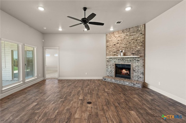 6119 Big Tree Dr, Salado, TX 76571 - unfurnished living room featuring wood finished floors, ceiling fan, recessed lighting, baseboards, and a fireplace