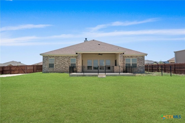 6119 Big Tree Dr, Salado, TX 76571 - back of property with ceiling fan, a patio area, and brick siding
