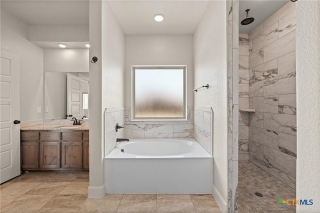 6119 Big Tree Dr, Salado, TX 76571 - full bath with a garden tub, a tile shower, and vanity