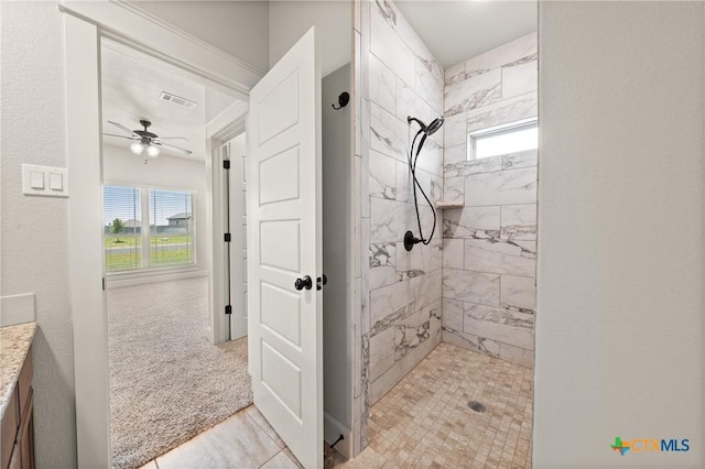 6119 Big Tree Dr, Salado, TX 76571 - full bath with healthy amount of natural light, tiled shower, ceiling fan, and vanity