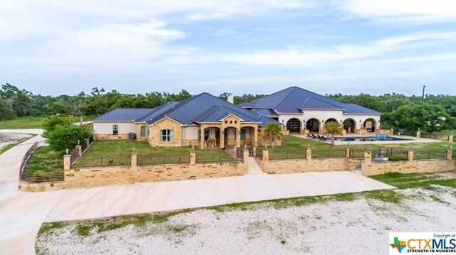 view of front of home featuring a front lawn