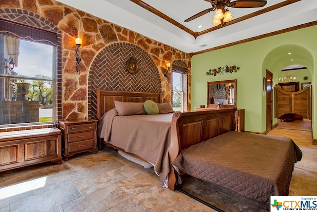 bedroom featuring ceiling fan and crown molding