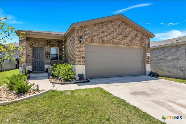 304 Stone Water Ln, Jarrell, TX 76537 - ranch-style home with brick siding, an attached garage, concrete driveway, and a front lawn