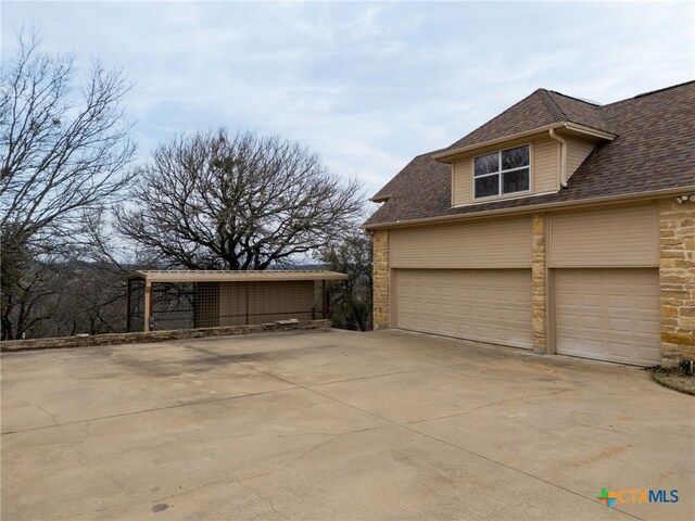 garage with driveway