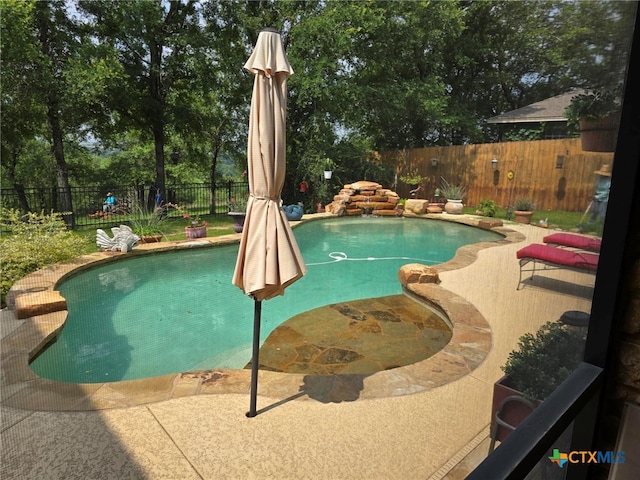 view of pool with a patio