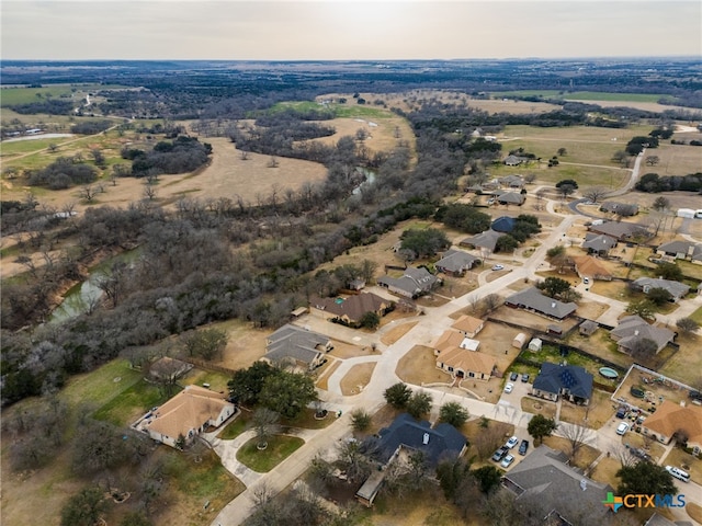 birds eye view of property with a residential view