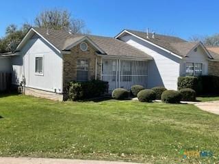307 Hickok Ct, Austin, TX 78753 - view of front facade featuring a front yard