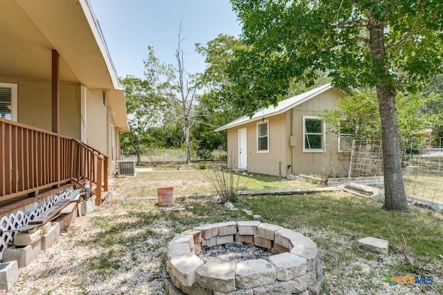 1488 Canyon Edge, Canyon Lake, TX 78133 - view of yard with a fire pit and cooling unit