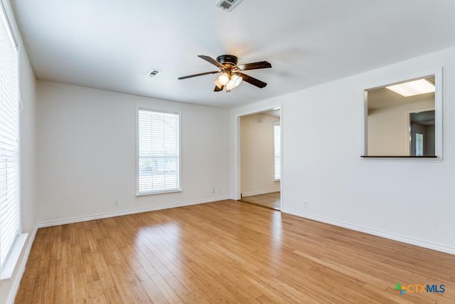 1488 Canyon Edge, Canyon Lake, TX 78133 - empty room with ceiling fan, light wood-style flooring, and baseboards