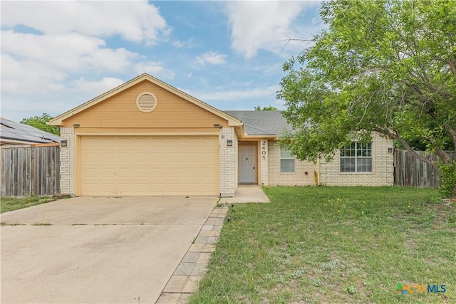 2405 Thoroughbred Dr, Killeen, TX 76549 - ranch-style home featuring brick siding, concrete driveway, and fence