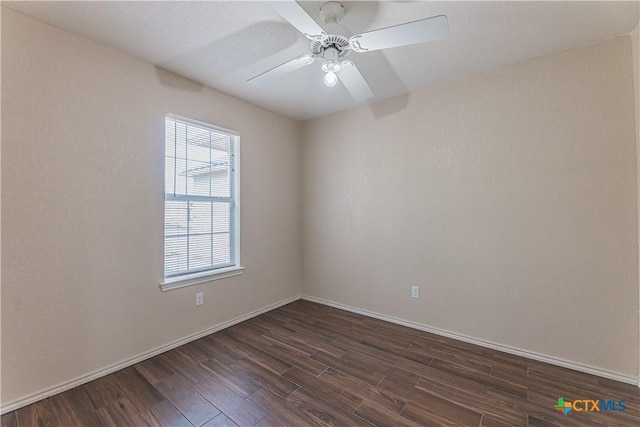 2405 Thoroughbred Dr, Killeen, TX 76549 - empty room featuring a ceiling fan, baseboards, and dark wood-type flooring