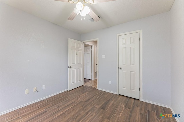 2405 Thoroughbred Dr, Killeen, TX 76549 - unfurnished bedroom featuring wood finished floors, a ceiling fan, and baseboards