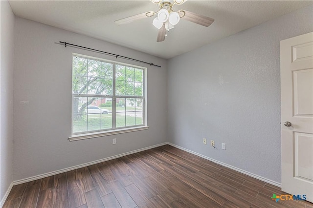 2405 Thoroughbred Dr, Killeen, TX 76549 - unfurnished room featuring baseboards, dark wood-type flooring, and ceiling fan