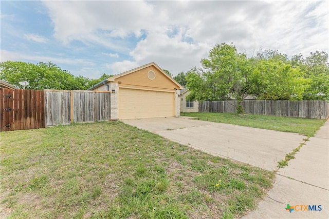 2405 Thoroughbred Dr, Killeen, TX 76549 - exterior space featuring a front lawn, fence private yard, and a garage