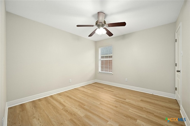 spare room with ceiling fan and light hardwood / wood-style flooring