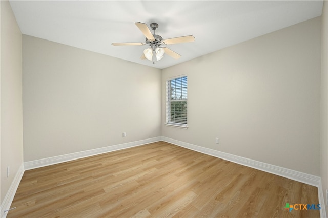 empty room with light hardwood / wood-style floors