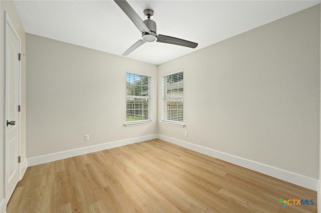 unfurnished room with ceiling fan and light hardwood / wood-style floors