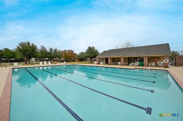 view of pool featuring a patio area