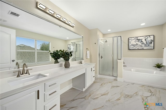 bathroom with vanity and plus walk in shower