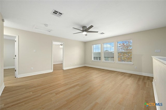 unfurnished room with light hardwood / wood-style flooring and ceiling fan