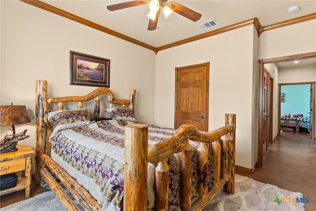 bedroom with visible vents, ceiling fan, baseboards, and ornamental molding