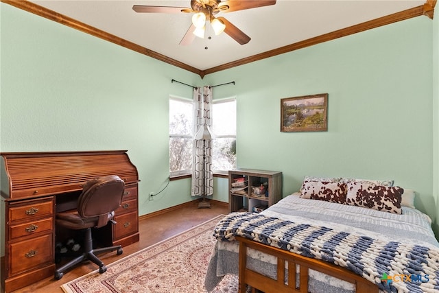 bedroom featuring baseboards, a ceiling fan, and crown molding