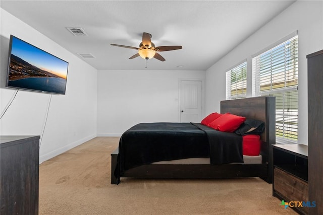 9108 Sage Loop Ct, Temple, TX 76502 - carpeted bedroom with baseboards and a ceiling fan