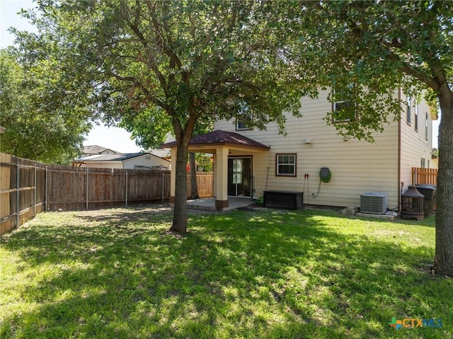 9108 Sage Loop Ct, Temple, TX 76502 - rear view of house with central air condition unit and a patio area